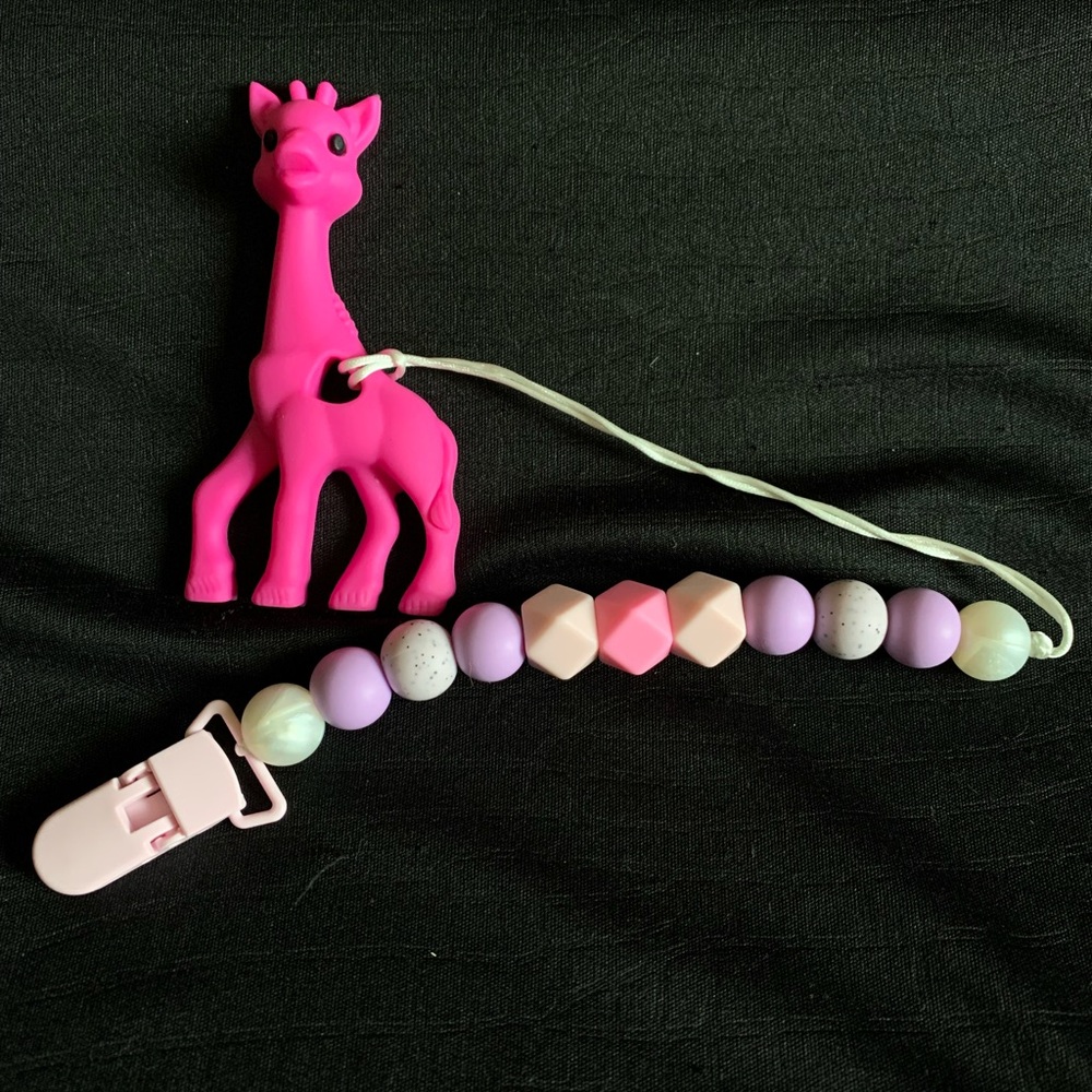 Pink giraffe teething set brand new